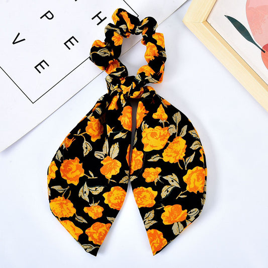 Elegantes Haarband mit Perlen & Blumen-Schleife